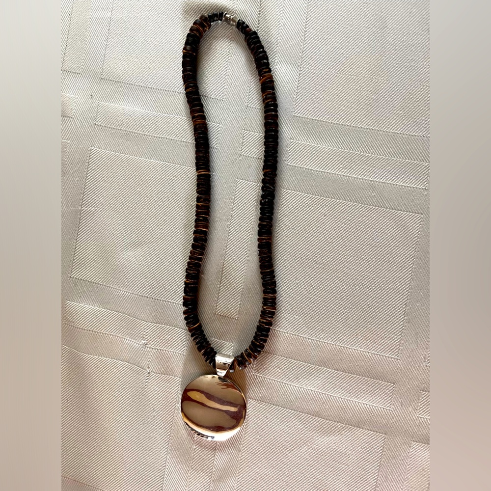 Silpada Sterling Circle pendant with wooden chain